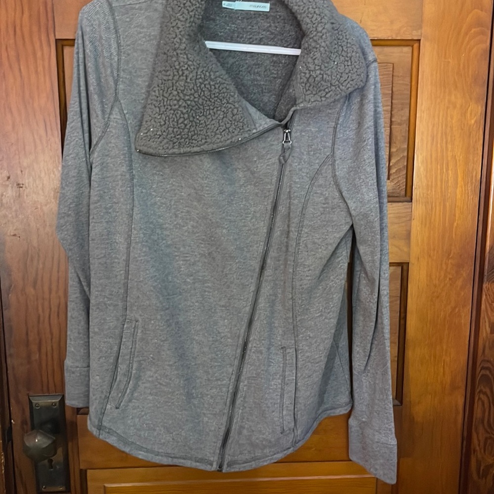 Zip up sweater/sweatshirt.